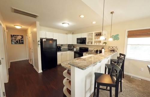 Colington Harbour Casa | CH113- Beautiful 3 BR on Canal- Stunning Interiors- Sunset Views- Fire Pit!