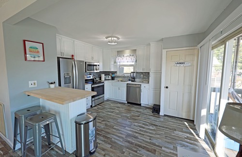 Colington Harbour Casa | CH219- 3 Bedroom Canal front Home with Private Dock and Kayaks!