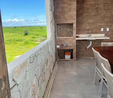 Cajueiro da Praia Apartamento | Chalé Encantador com Rooftop Privativo