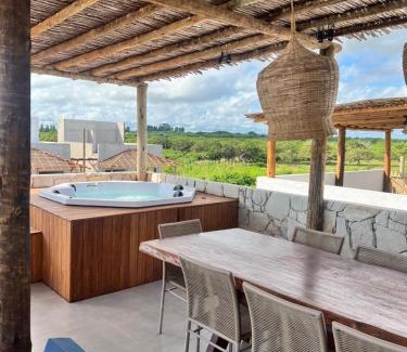 Cajueiro da Praia Apartamento | Chalé Encantador com Rooftop Privativo