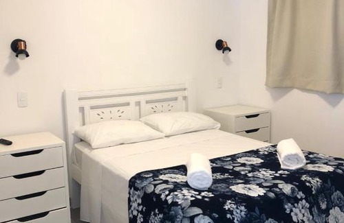 Centro Comercial Apartamento | Chalés Porto Perequê