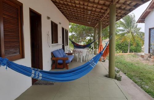 Pacatuba Casa | CHALE PERTO DA PRAIA COM DUAS SUITES E VARANDAO