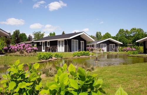 Municipality of Veldhoven Chalet De Esquí | Chalet in Netherlands by Scenic Pond