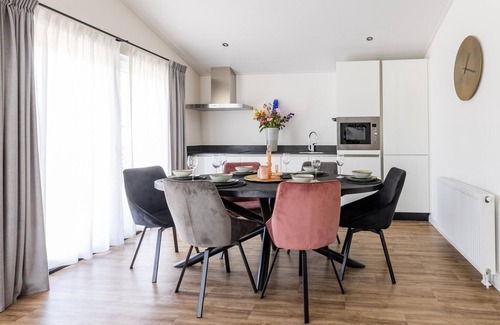 Municipality of Veldhoven Chalet De Esquí | Chalet in Netherlands by Scenic Pond