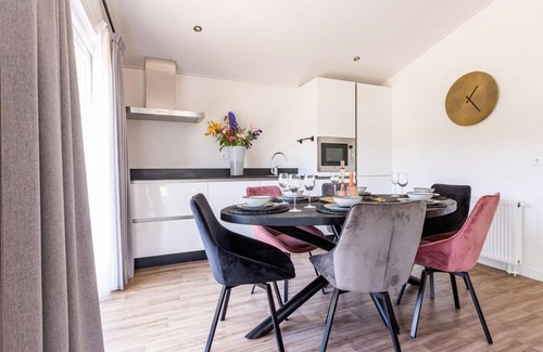 Municipality of Veldhoven Chalet De Esquí | Chalet in Netherlands by Scenic Pond