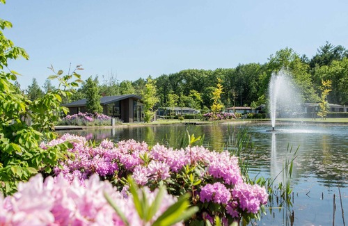 Municipality of Veldhoven Chalet De Esquí | Chalet in Netherlands by Scenic Pond