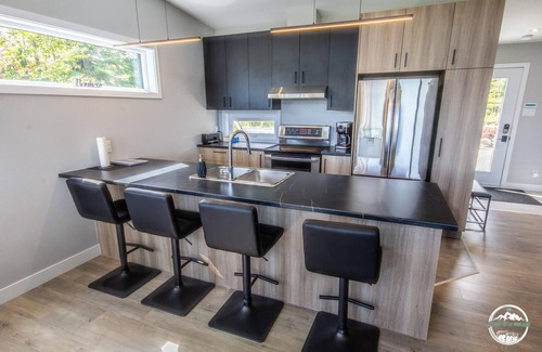 Matawinie Regional County Municipality Chalet De Esquí | Chalet with fireplace and mountain spa, golf view