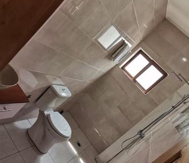 Limbe Apartamento | Chambre de luxe chez FOUR IN ONE Résidence