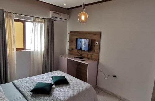 Limbe Apartamento | Chambre de luxe chez FOUR IN ONE Résidence