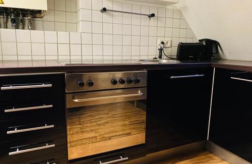 Nord-Mitte Apartamento | Charmante Ferienwohnung mit Kaminofen