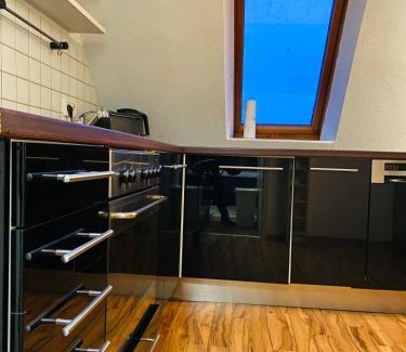 Nord-Mitte Apartamento | Charmante Ferienwohnung mit Kaminofen