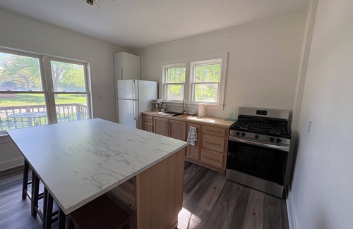 Lake Mills Casa | Charming 1900 home with furnished kitchen and king bed