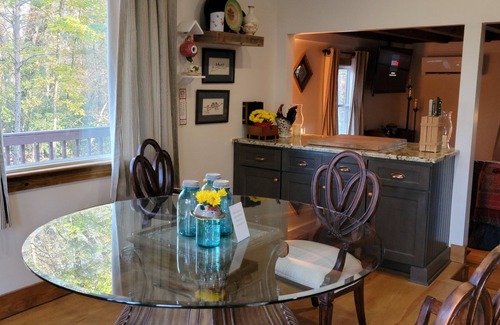 Pilot Mountain Otro | Charming two-bedroom farmhouse nestled in the woods of Pilot Mountain, NC.