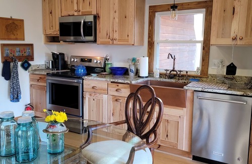 Pilot Mountain Otro | Charming two-bedroom farmhouse nestled in the woods of Pilot Mountain, NC.
