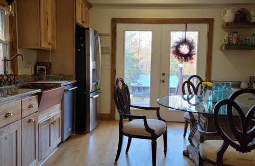 Pilot Mountain Otro | Charming two-bedroom farmhouse nestled in the woods of Pilot Mountain, NC.