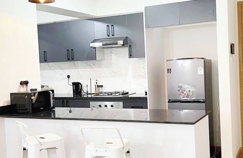 Nairobi Condominio | Charming 2-bedroom condo in enchanting Nairobi with fitness room & swimming pool