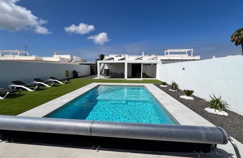 Playa Blanca Villa | Charming 3-bedroom villa with heated swimming pool , AC throughout and WiFi