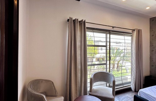 Lahore Casa | Charming 3-bedroom house with AC, WiFi in lively DHA Lahore