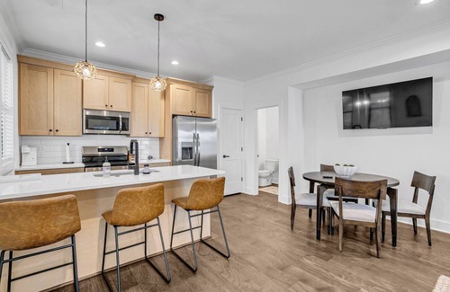Dunean Casa | Charming 3-BR townhome < 1 Mile from Fluor Field: Garage, E-Bike Rental, 2KingB
