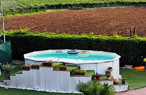 Costermano Villa | Charming 4-bedroom estate in enchanting Albaré Stazione with AC, WiFi
