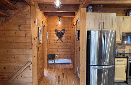 Carrabassett Valley Chalet De Esquí | Charming 4-bedroom mountainside chalet on Sugarloaf golf course