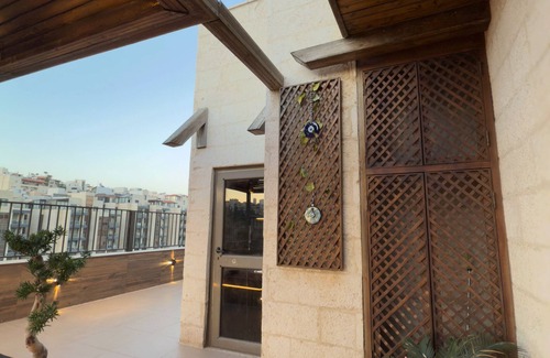Amman Apartamento | Apartamento encantador en Ammán con aire acondicionado central y aparcamiento