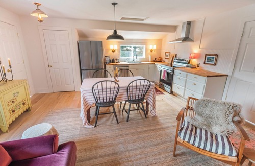 Seaside Cabaña | Charming and cozy coastal escape steps from the beach. Pet friendly!