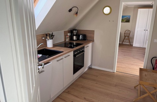 Spiekeroog Apartamento | Charming apartment for 2 persons in the house Seeschwalbe up de Dün at TRANPAD 9