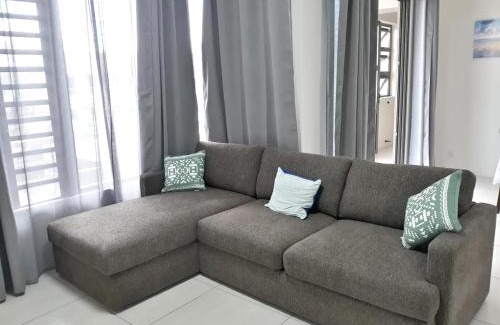 Flic-en-Flac Apartamento | Charming apartment in Flic en Flac with shared pool