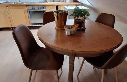 Royken Apartamento | Charming attic apartment by the sea - with fireplace and cozy living room