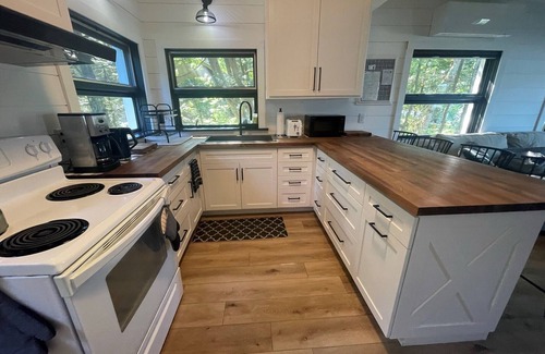 Lake Leelanau Casa | Charming beach house on Lake Leelanau. Includes kayaks and a fireplace.
