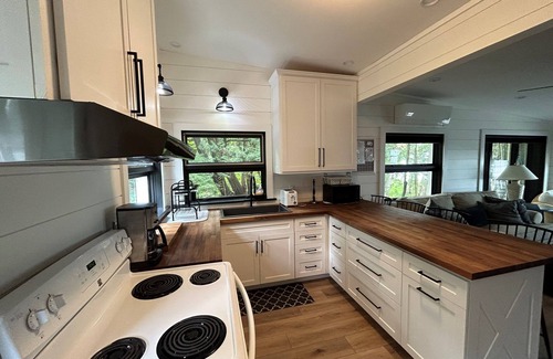 Lake Leelanau Casa | Charming beach house on Lake Leelanau. Includes kayaks and a fireplace.