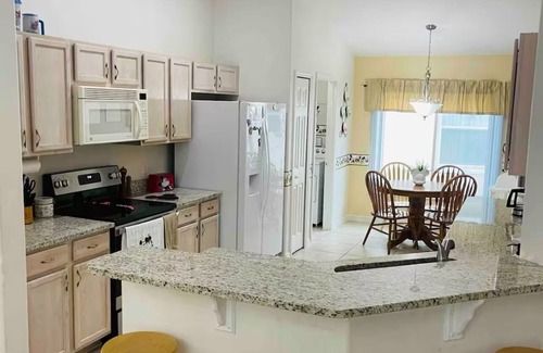 Cumbrian Lakes Casa | Charming Disney 4-bedroom home w/ private pool, WiFi, AC in quiet neighborhood