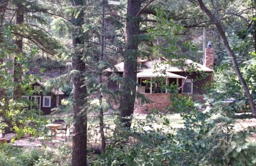 Cascade Cabina | Charming, historic, Creekside Cabin nestled at the base of Pikes Peak in Cascade