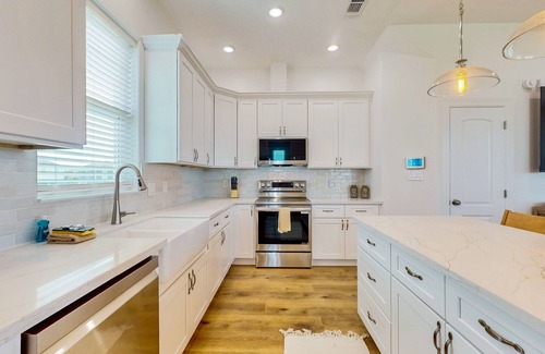 Pointe San Luis Casa | Charming home w/ shared pool, nearby beach, & covered patio with bay views