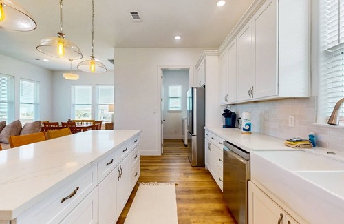 Pointe San Luis Casa | Charming home w/ shared pool, nearby beach, & covered patio with bay views