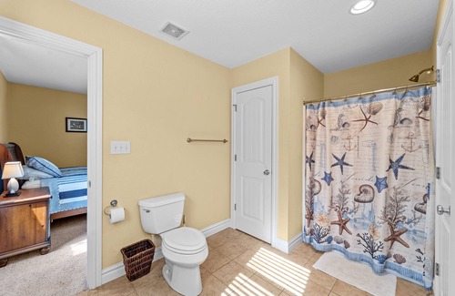 Southern Shores Casa | Charming home with wraparound balcony, central AC, full kitchen, & W/D