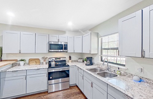 Blanco Cabina | Charming home with grill, full kitchen, central AC, & W/D