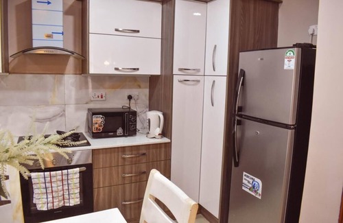 Kilimani Casa | Charming luxury apartment in enchanting Nairobi with a big balcony, gym & pool.