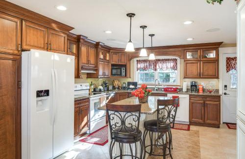 Manchester Casa | Charming Manchester Retreat with Patio and Fireplace!