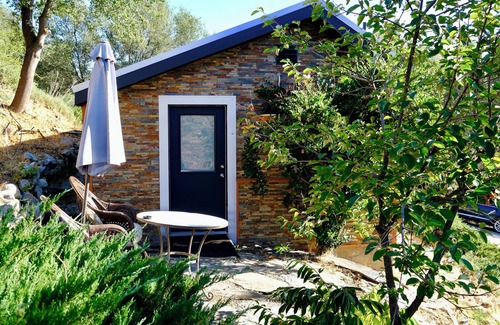 Midpines Cabina | Charming stone clad cabin with views off Highway 140 towards Yosemite
