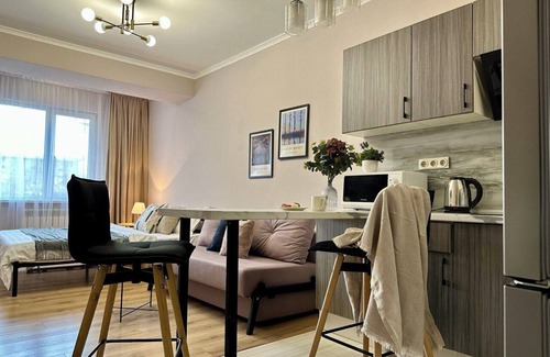 Almaty Apartamento | Charming studio Merenga in wonderful Almaty with WiFi, AC
