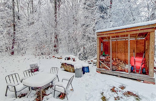 Alton Bay Casa | Charming & sun-filled nature escape with large deck, wood stove, fire pit, & W/D