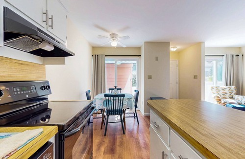 Brandy Wine Village South Casa | Charming townhome with patio, W/D, central AC, close to beach & golf
