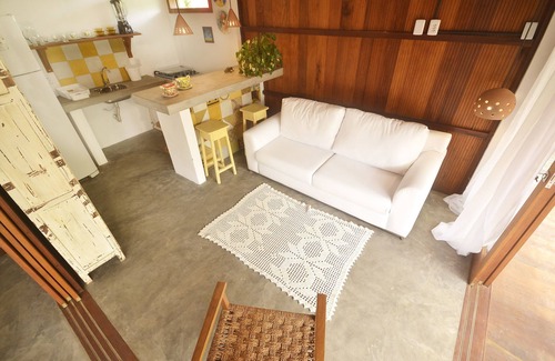 Barra Grande Casa | Charming Yellow Bungalow on Algodões Beach with full kitchen.