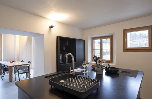Engadin Scoul Apartamento | Chasa Chaposch – Tradition meets comfort in a exklusivly renovated Engadine house