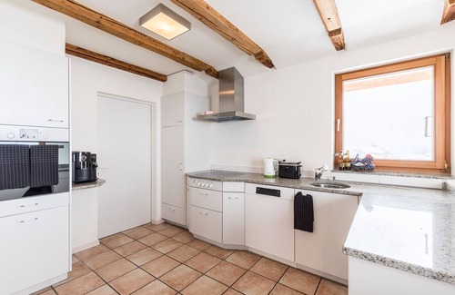 Engadin Scoul Apartamento | Chasa La Tschuffa: Exclusive house with 4.5-room maisonette at the foot of Tarasp Castle