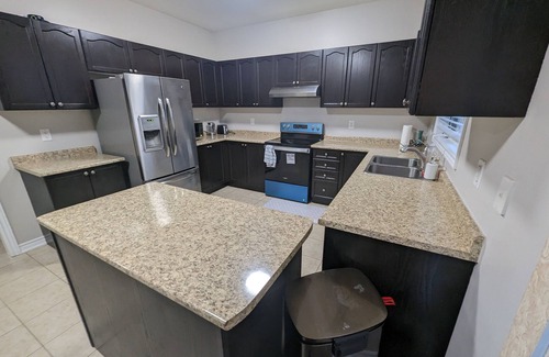 Alcona Casa | Cheerful 4 Bedroom house with indoor fireplace