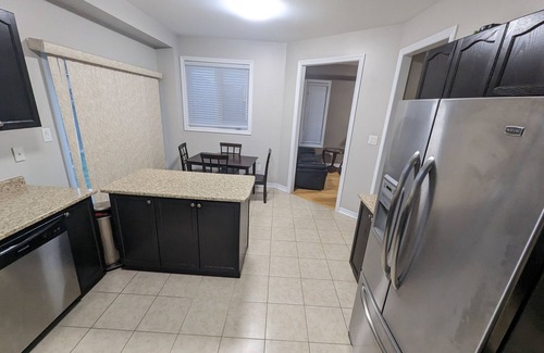 Alcona Casa | Cheerful 4 Bedroom house with indoor fireplace