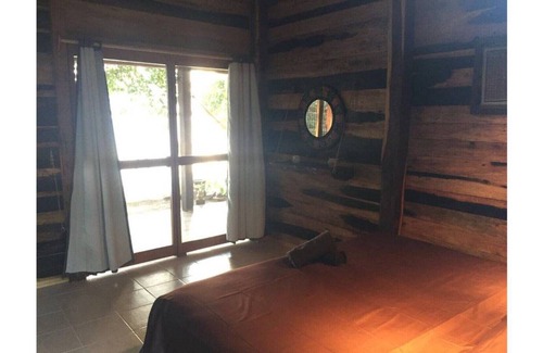 Chunhuhub Casa | Cabaña WAÁY vista/acceso espectacular a la Laguna milagros
